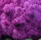 Purples cauliflower with brown spots indicating oxidation.