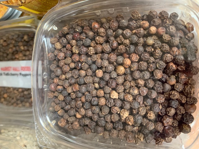 Black peppercorns.