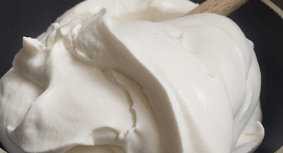 A picture of whipped cream, in this case representing a French version of sour cream.