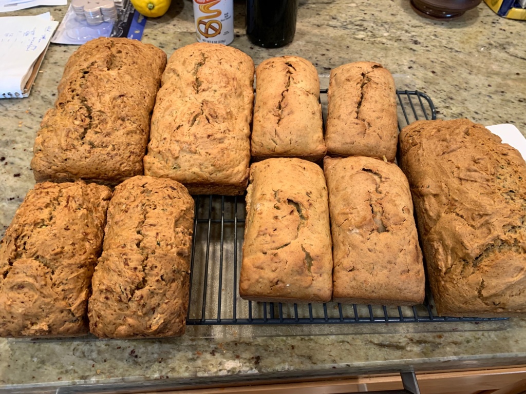 Picture of three large and 6 small zucchini loafs.