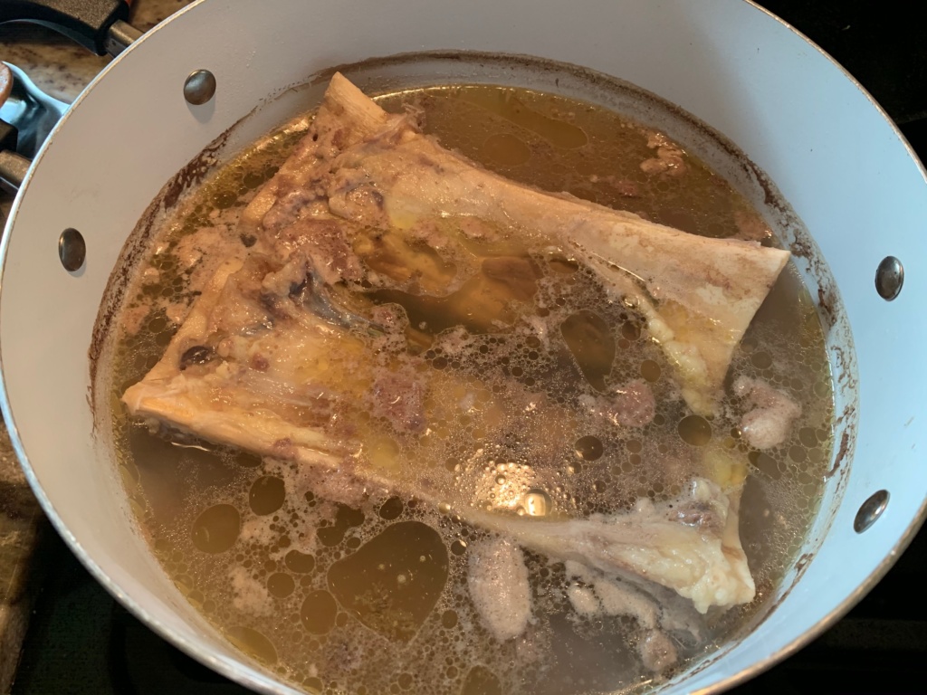 Photo of a pot of beef bone broth..