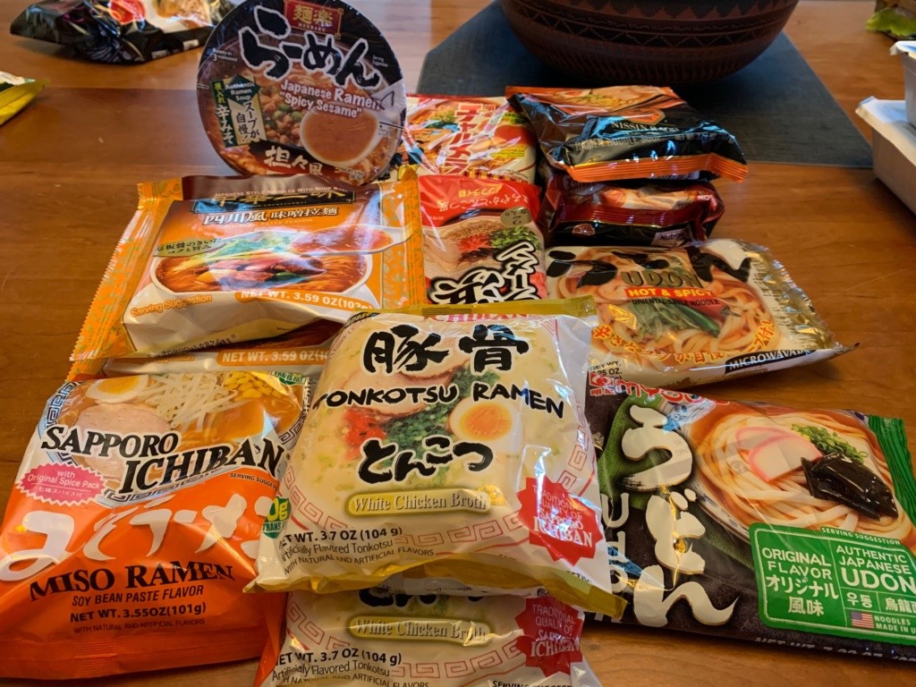 A photo of Japanese noodle + soup packages.