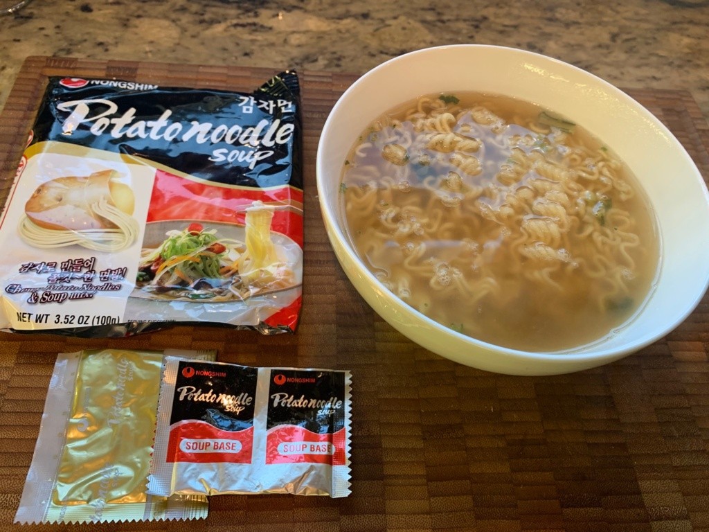 Photo of soup packages and the bowl of noodle soup.