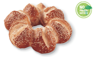 A Brot Box photo of rounded ring of individual pretzel biscuits topped with sesame seeds.