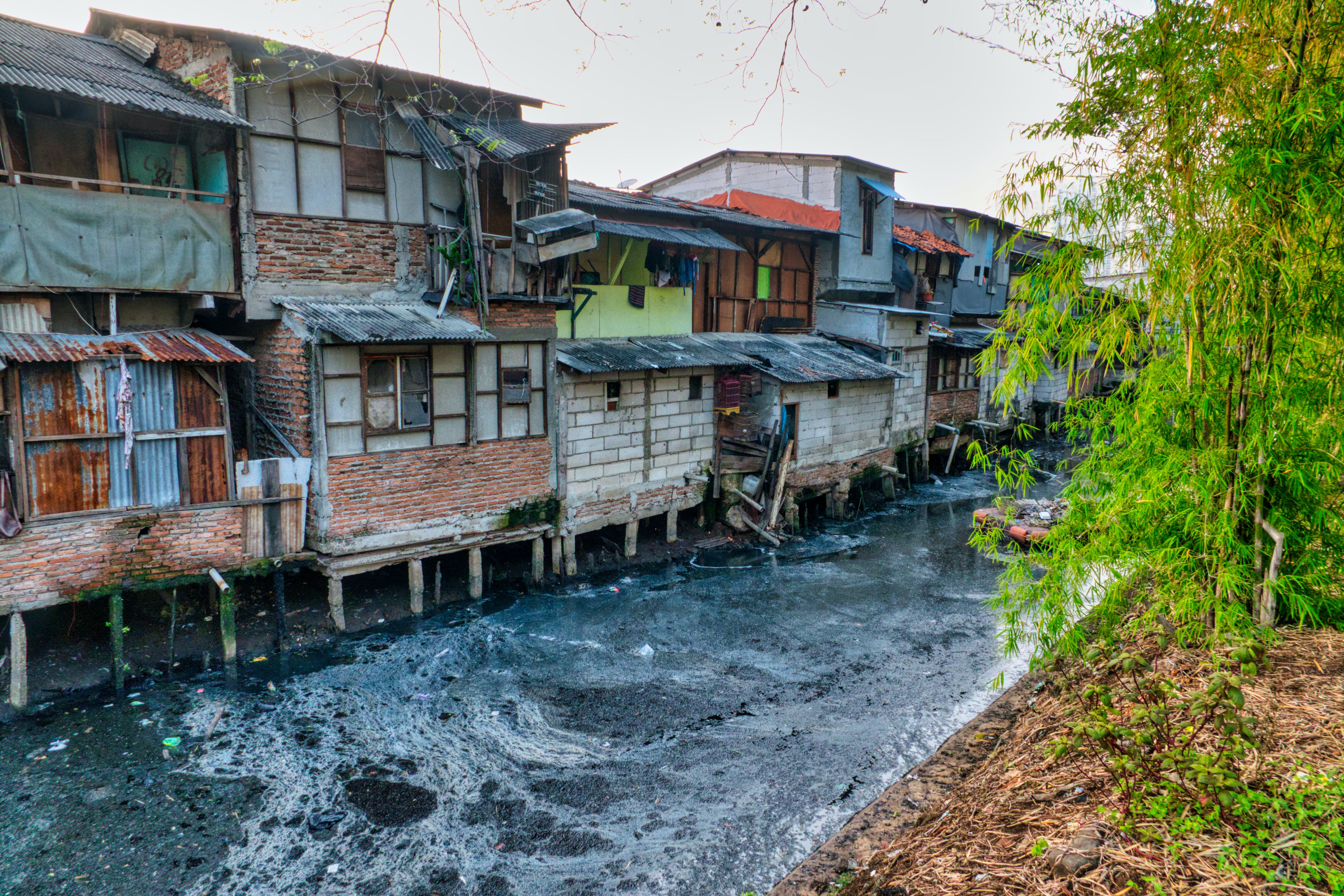 Brown Wooden House on Body of Water