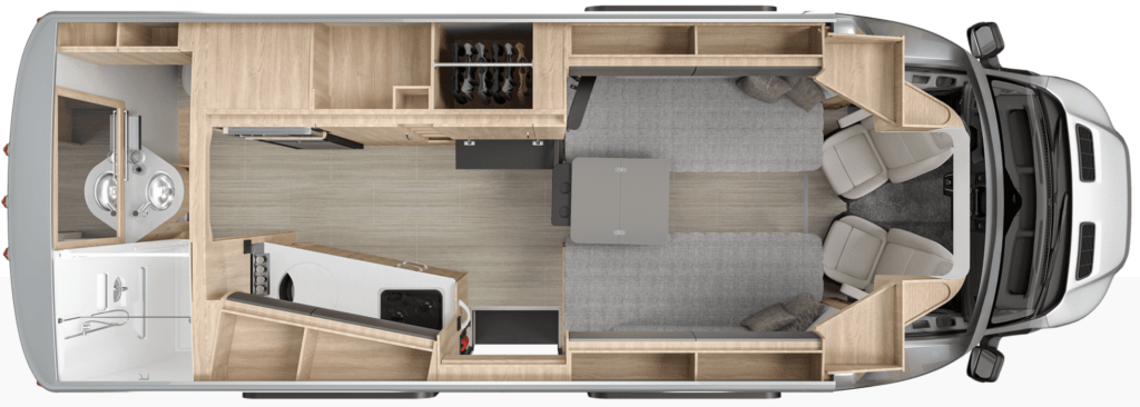 An overhead model of the interior of the front twin bed. It shows the driver and passenger seats turned to face away from the road, twin beds with a fold out table, cabinetry, the kitchen and a full dry bathroom.