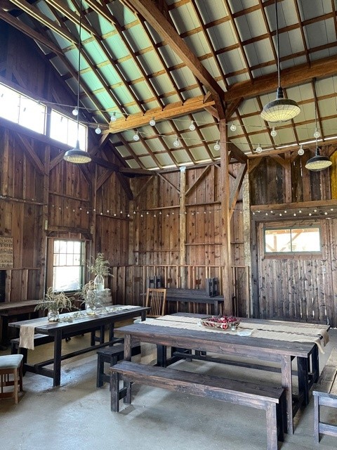 Interior of a renovated 100 year old barn set for a catered event.