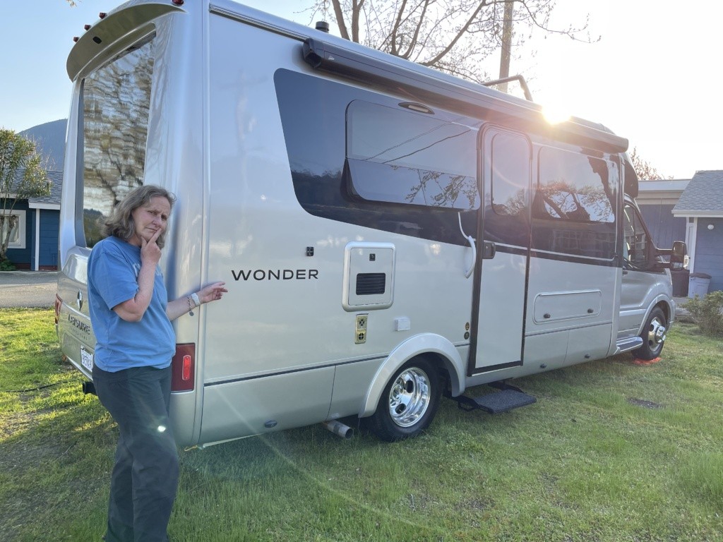 Standing by the RV at our first hookup in Lake County.